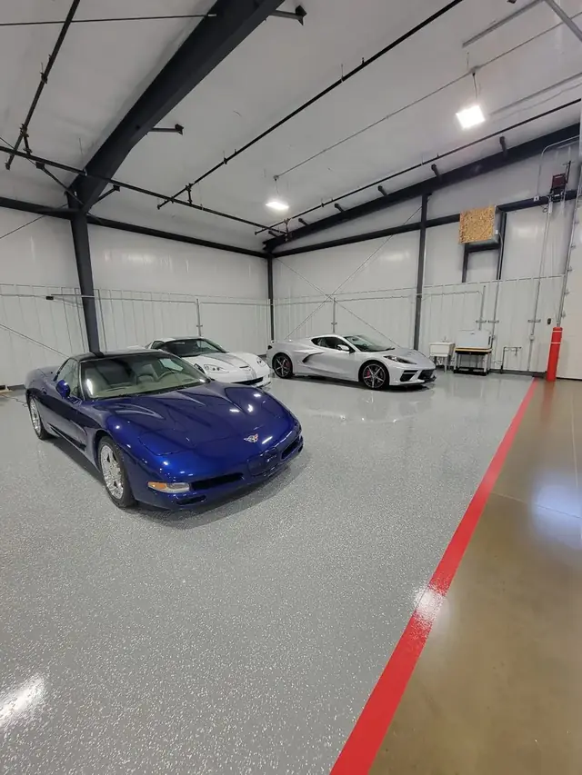 Garage floor coating with classic cars parked