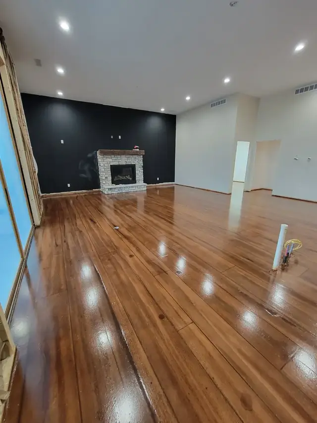Wood-look coated concrete floor in an open room